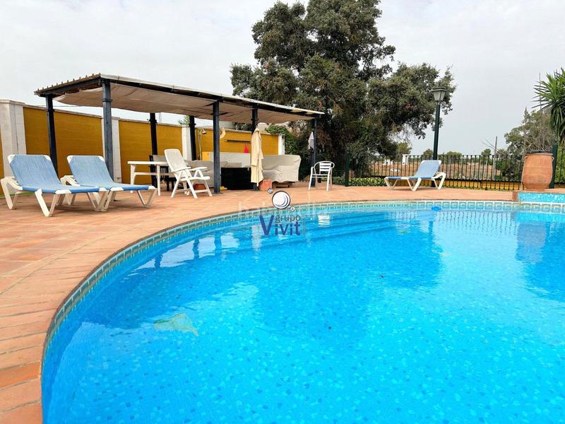 Foto 34f9de03-9bab-4880-b50b-67069c5544f6. Chalet avec parking piscine dans Oromana Alcalá de Guadaira