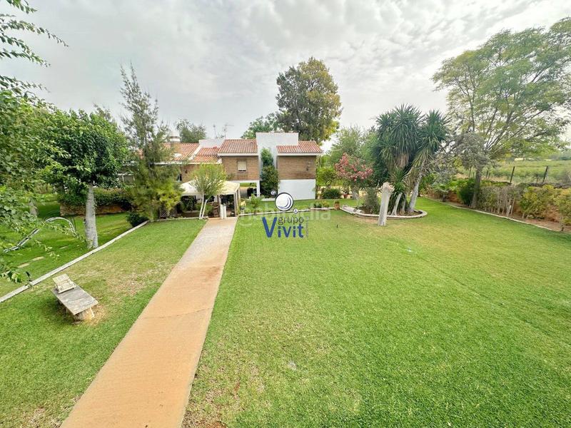 Foto db7dad67-7b28-4d34-9ece-977f861cc5f2. Chalet avec parking piscine dans Oromana Alcalá de Guadaira