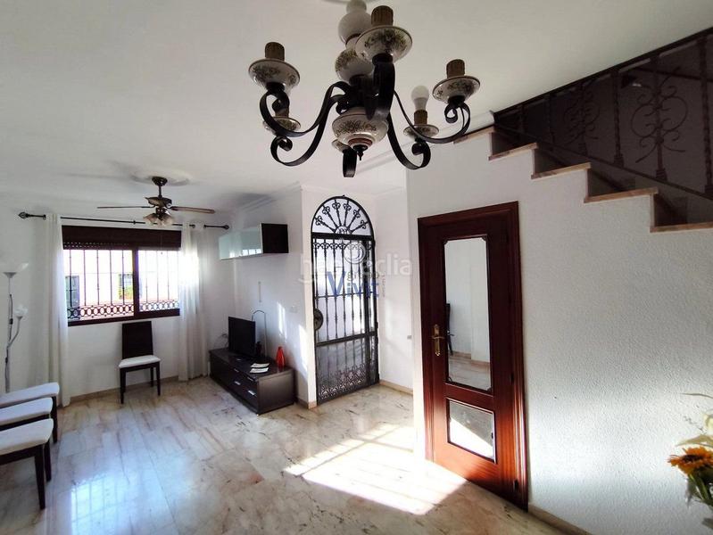 Foto c22bc583-49fb-4f0e-9430-2bf7b0d15582. Casa con parcheggio in La Paz Alcalá de Guadaira