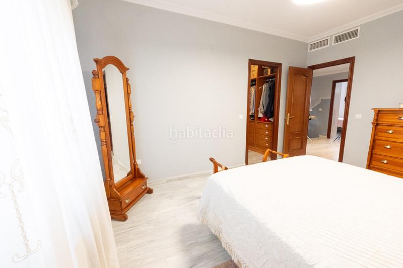 Foto 8b3d86ab-3539-4b0a-9932-34a231754ca8. Casa adossada amb calefacció aparcament a El Junquillo - Vistalegre Utrera