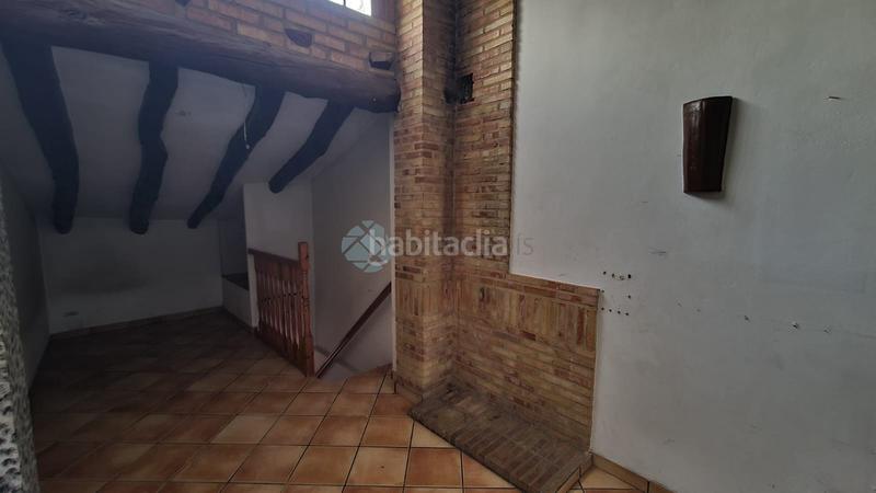 Foto e186d2b2-bff9-4afd-bb0e-aa5dbbbac234. Casa adossada a Serra