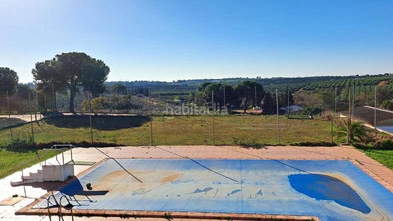 Foto 8c8f10e6-dcaf-40d9-a428-22432f0f9e81. Casale con parcheggio piscina in Mairena del Alcor