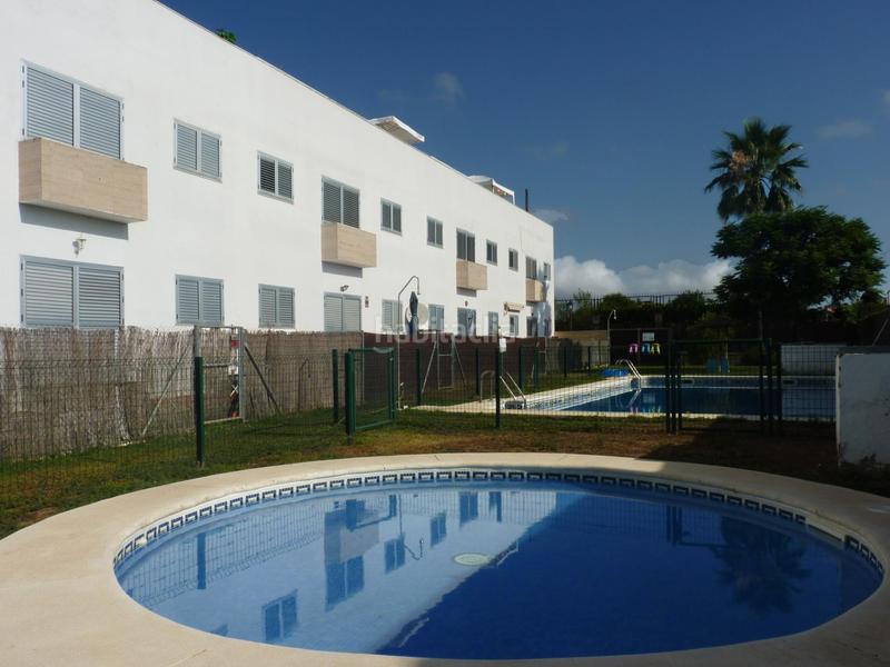 Foto af6d3aa0-f1c7-4a32-924d-20a92ef94b4f. Appartamento con riscaldamento parcheggio piscina in Sanlúcar la Mayor