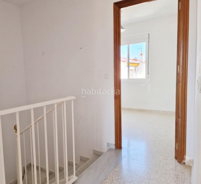 Foto 118d5dac-cd86-4834-bf0a-4848ef341472. Casa adossada amb calefacció a Umbrete