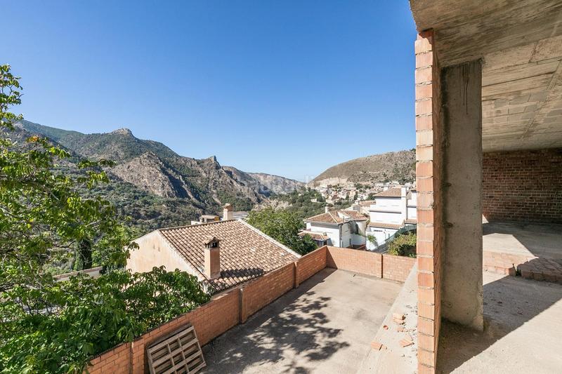 Foto af36c15e-c31d-4f43-8604-c1ec06c09e94. Terrain résidentiel dans calle serpentina 13 dans Güéjar Sierra