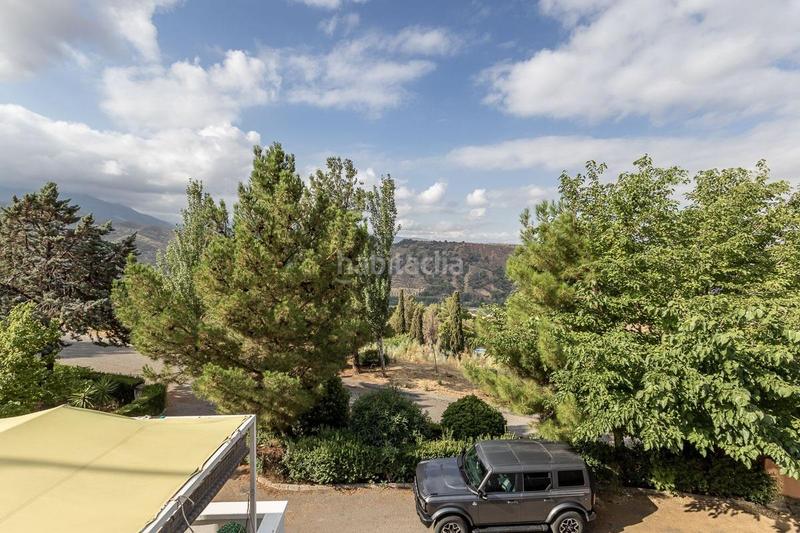 Foto f8fde233-a27b-4370-8040-ada106710bbc. Casa a schiera con piscina in Cenes de la Vega