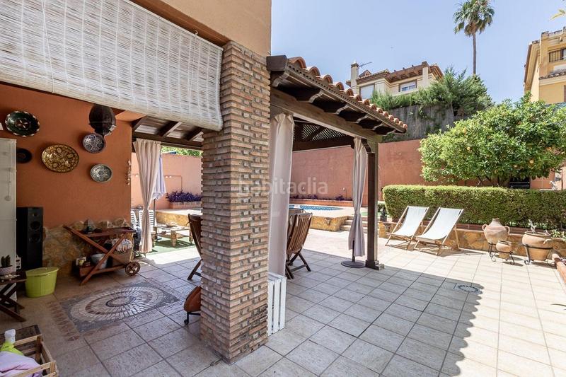 Foto fdc4d9f3-54f0-4aa4-813d-b9e67ad263e7. Casa adosada chalet familiar con jardin, piscina privada y vistas a granada en pleno centro de la zubia en Zubia (La)