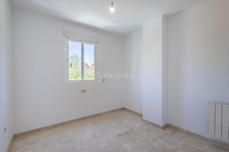 Foto 9bd73e4d-dfd2-4497-a7d8-e7ac1f251e68. Pis amb calefacció aparcament a Rosaleda - Juventud Granada