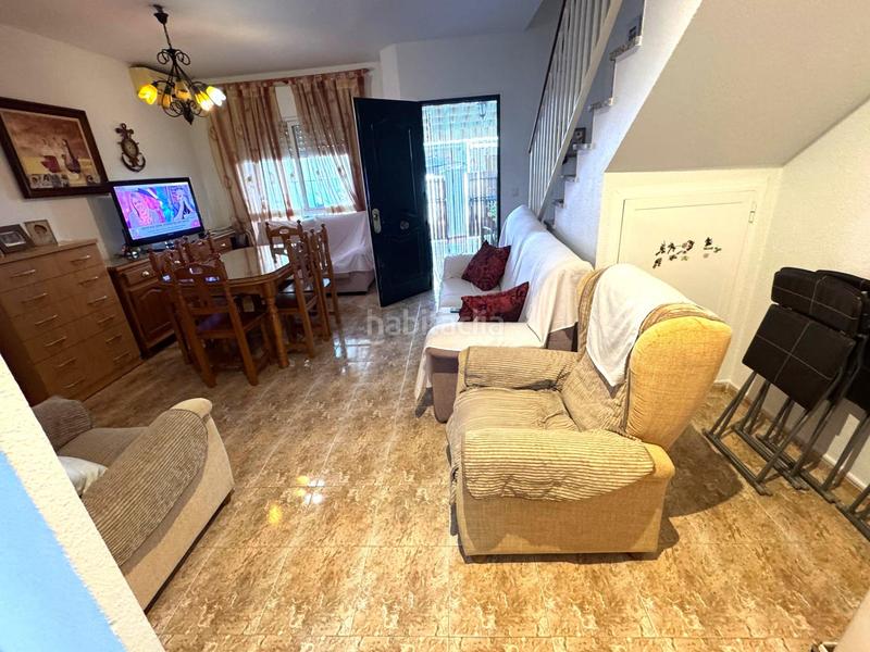 Foto c741ce1d-be77-44fd-a762-f4866db93422. Casa adossada amb aparcament piscina a El Portil