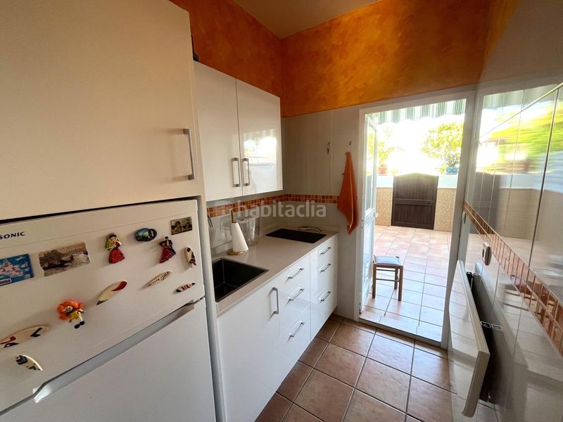 Foto 0d7cbd70-277b-4ccb-a39a-2f8744df2e38. Casa adossada amb aparcament piscina a El Portil