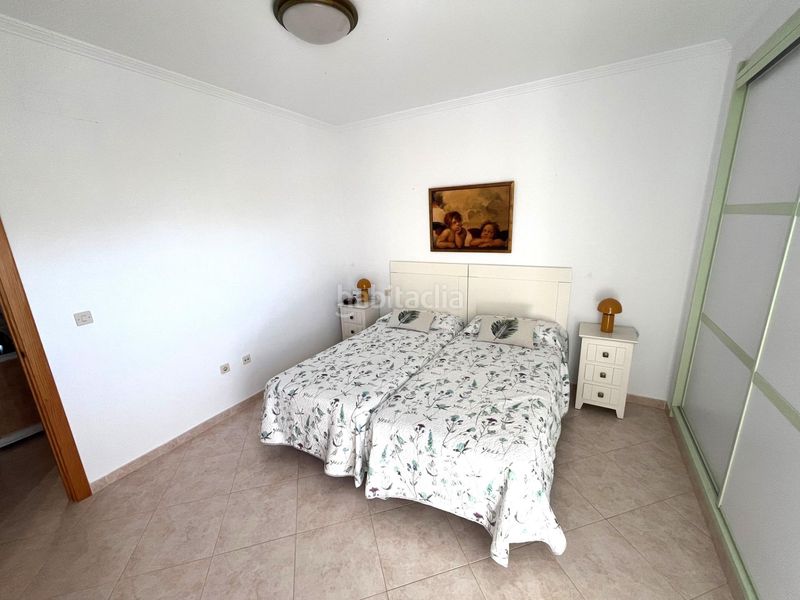Foto 4a10cbce-2e11-40ca-a9e8-50c7fc2878c6. Casa adossada amb aparcament piscina a El Portil