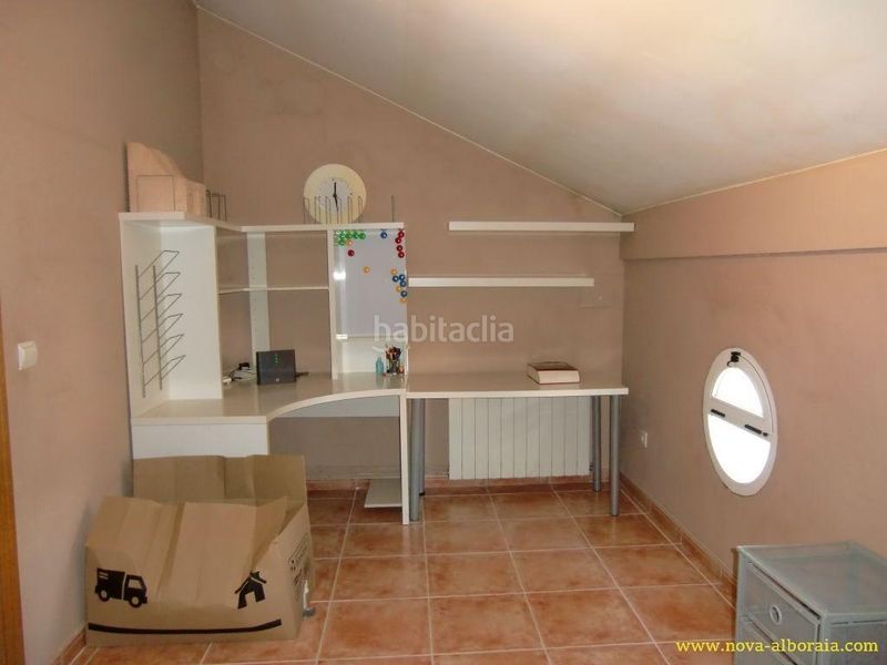Foto f8156077-c493-46bb-8776-caa4b829e37c. Casa aparellada amb aparcament piscina a Mas Camarena Bétera