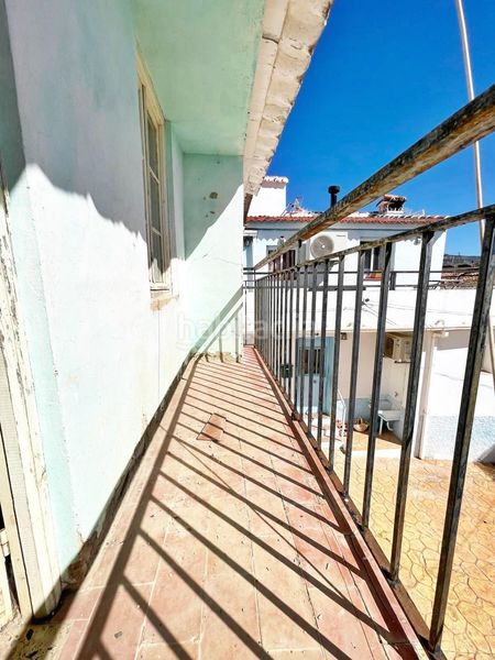 Foto e2565ad1-f2b1-43f8-9acf-76cb6821230d. Casa amb aparcament a Periana