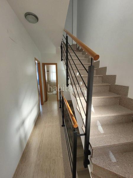 Foto 4c65464b-e403-43f1-aa89-fcb2e0e6c5af. Casa adossada amb aparcament piscina a Playa-Ben Afeli Almazora / Almassora