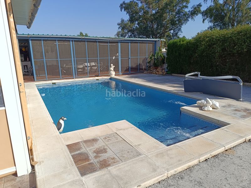 Foto f9fe9933-ef82-4faf-8219-155def4d4650. Xalet amb xemeneia aparcament piscina a Carmona