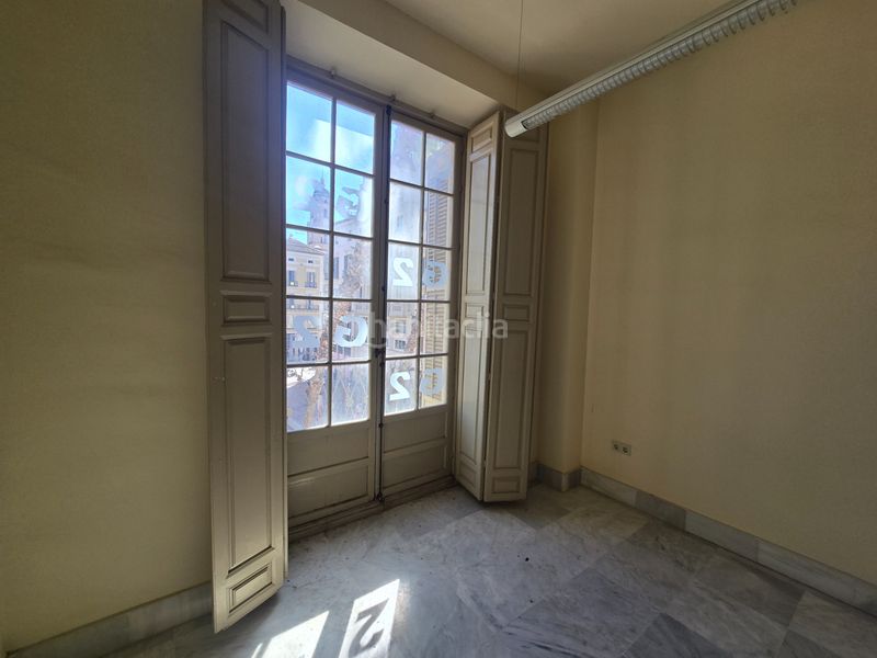 Foto 881561a7-0c0d-48ec-a486-d2482e42e1c9. Apartamento en plaza de la constitución 1 una propiedad única y emblemática con vistas a la calle larios en Málaga