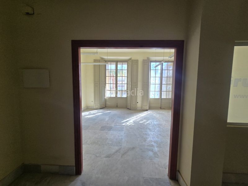 Foto d368b16f-ac20-435e-aff0-c5c93a9ca6f5. Apartamento en plaza de la constitución 1 una propiedad única y emblemática con vistas a la calle larios en Málaga