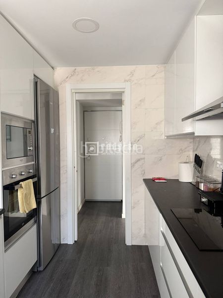 Foto 2b92395a-f570-4b36-9d0c-cd297debf40b. Flat with heating in Los Rosales Madrid