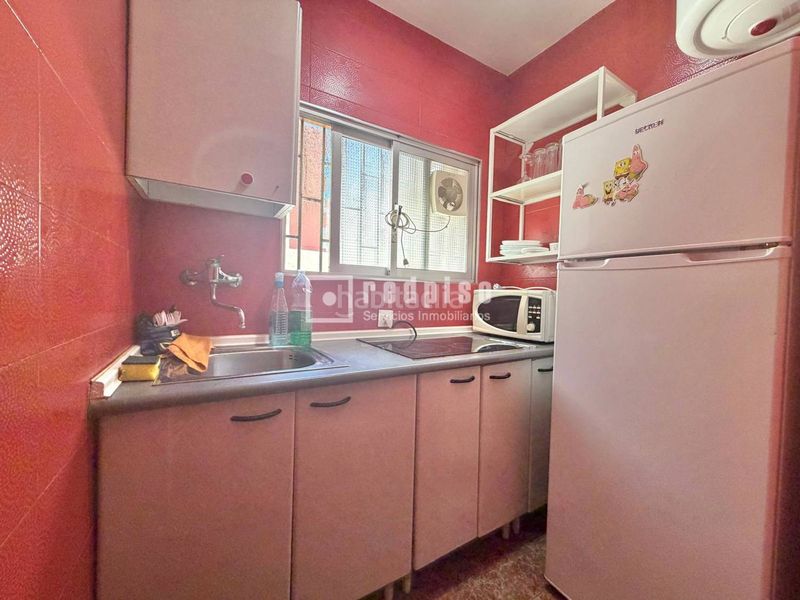 Foto be3ec9a9-c7c2-416e-8b08-f4c688962983. Casa amb aparcament a La Trinidad Málaga