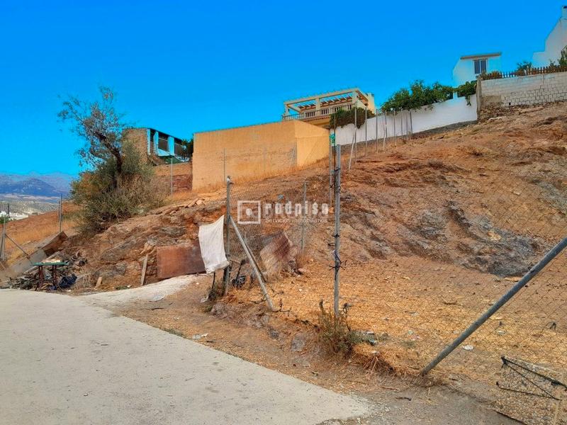 Foto c0fbc417-564c-4d6c-b3d3-a5fe070f1d47. Terreno residencial solar urbano , málaga ideal para construir tu hogar soñado a solo 40 minutos de la capital en Riogordo