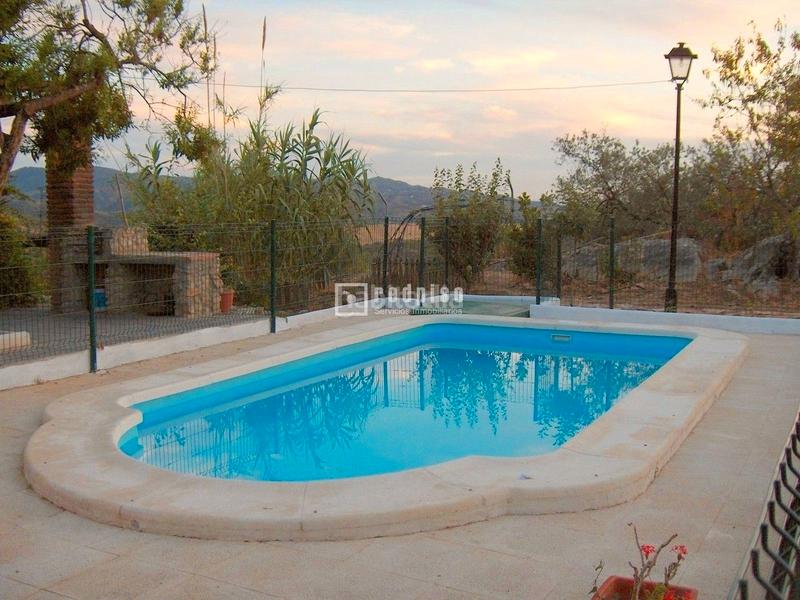 Foto 2047a2fc-99c1-43c2-aa58-0d985f13c918. Chalet espectacular finca rústica de 25.000 m con casa, piscina, producción de olivos ubicada a pocos minutos , málaga en Colmenar