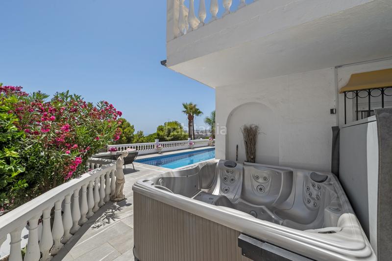 Foto 587bb8e9-c4e2-4317-bd39-71cf623a58b9. Maison avec parking piscine dans El Faro de Calaburra - Chaparral Mijas