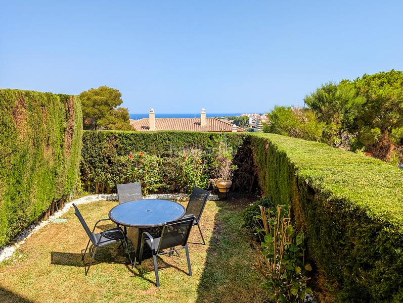 Foto 221a0fae-29c9-43a1-a519-bed3e5aa7c7b. Planta baja encantador apartamento en esquina en planta baja con amplio jardín y vistas al mar en Riviera del Sol en Mijas