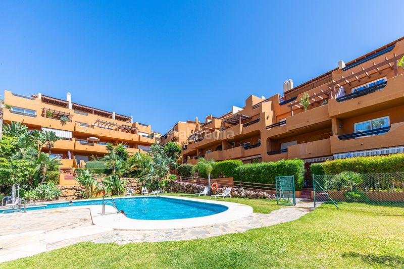 Foto cec0e9b3-b40d-4eb5-933e-64e0e1f3458e. Planta baixa amb aparcament piscina a Riviera del Sol Mijas