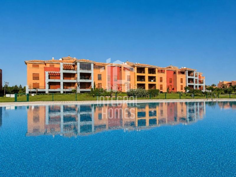 Foto b8ef1291-1e97-4dee-a4eb-ae8fae6df62e. Apartament amb aparcament a Isla Canela Ayamonte