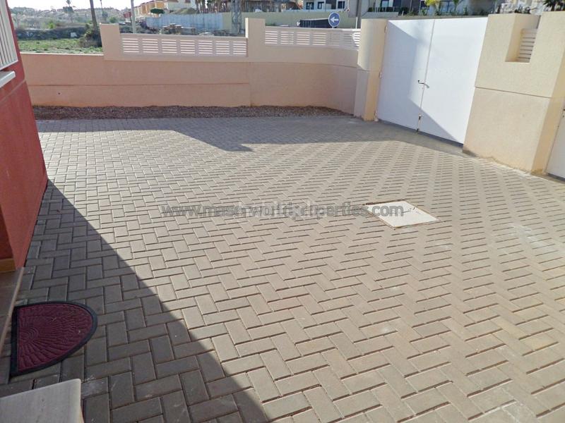 Foto b30ba3eb-2861-44f7-91ab-4771c63789f0. Planta baja  con amplia terraza y vistas al mar en Mazarrón