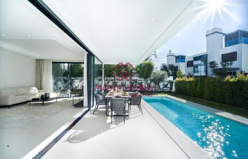 Foto 0c20d333-94a5-4a69-897d-bc747685aab1. Chalet lujosa villa moderna en venta milla de oro a pasos de la playa en Marbella