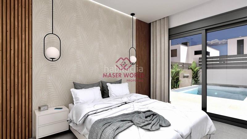 Foto 9151a17f-9d60-45d3-b81a-0cf50f4c0a7c. Casa pareada villas pareadas de lujo de nueva construcción costa blanca living en Benijófar