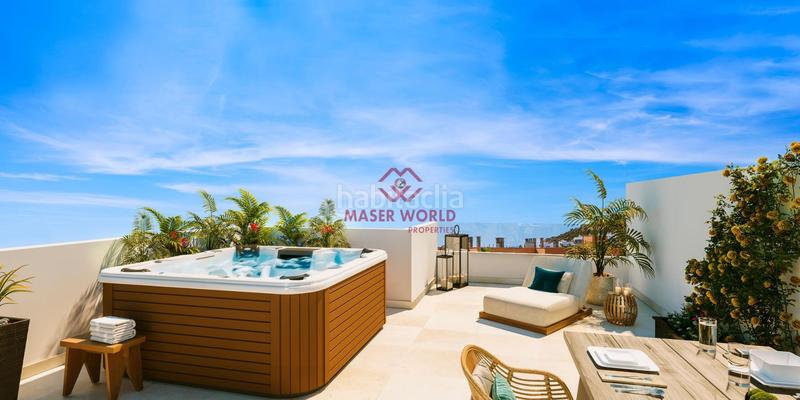 Foto e47b67f1-d463-4e1c-b5c5-d1b9a81ba258. Casa adosada residencial de obra nueva en las rocas en Manilva