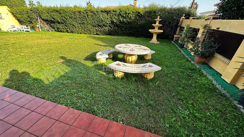Foto 503d686f-609f-4253-ab8b-e3d72a2d0351. Chalet magnífico chalet en una sola planta, con salón comedor con chimenea, salón solarium, 4 dormitorios con armarios empotrados, el dor en Espartinas