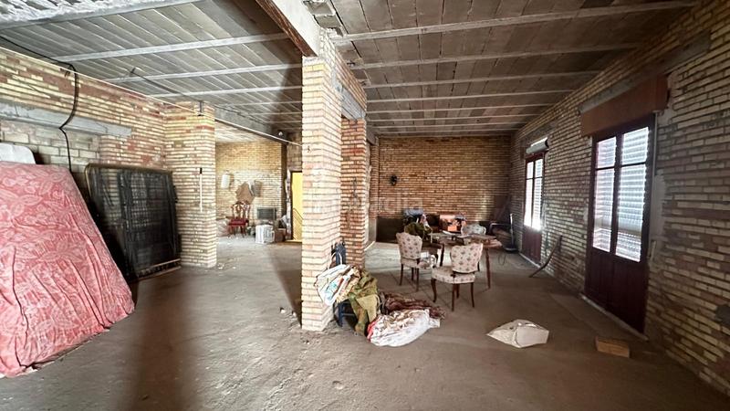 Foto 773aad78-87bb-4539-9418-9629b7034b82. Casa adossada amb aparcament a Salteras