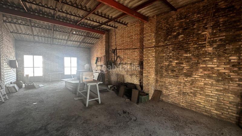 Foto a35ab237-c547-4b98-8d3f-92befbcc707e. Casa adossada amb aparcament a Salteras