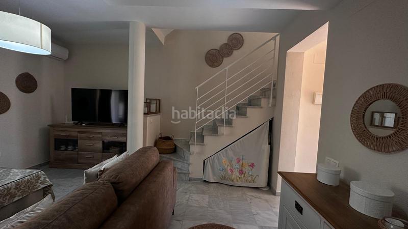 Foto 20a4ef0c-a1b4-4927-bbbe-68ff85f01cdb. Lloguer casa adossada amb piscina a Isla Cristina