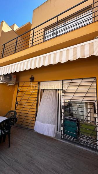 Foto 618f2a9f-287c-455c-819a-ab9cf290f608. Lloguer casa adossada amb piscina a Isla Cristina