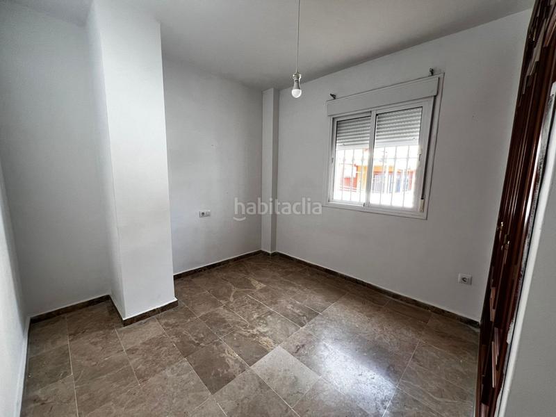 Foto c4ad5f81-e2e3-4876-8b99-805c3f832260. Maison jumelée avec chauffage parking dans Espartinas pueblo Espartinas