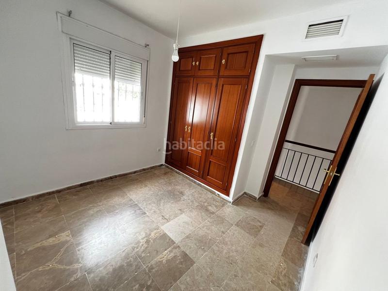 Foto f0fdd261-bcf1-4de2-9130-aa685804addf. Maison jumelée avec chauffage parking dans Espartinas pueblo Espartinas