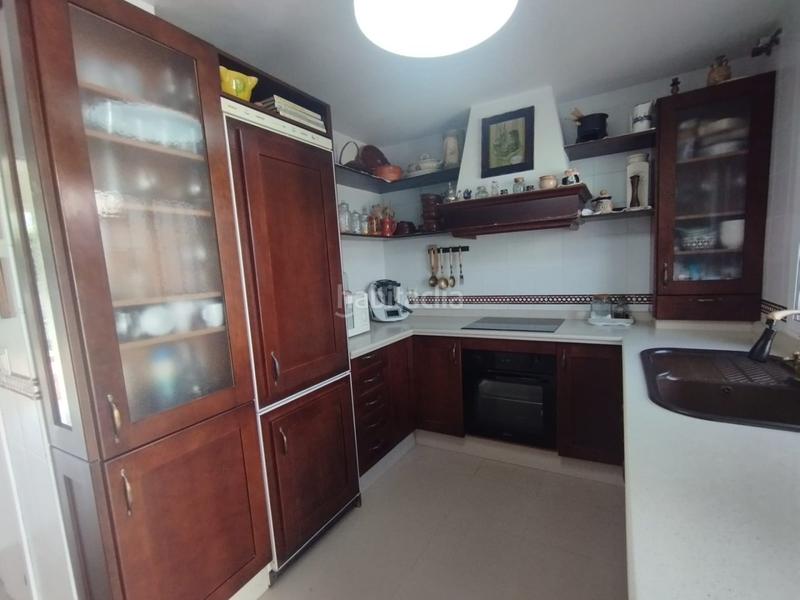 Foto 1568801a-105f-4f1e-9d01-74946c4a0163. Maison avec parking dans Castilleja de la Cuesta