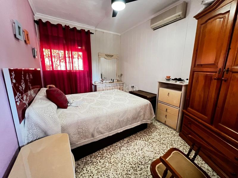 Foto 4fab4f3a-7da9-47ad-91a3-44859526ab8b. Chalet  con gran parcela, piscina, cocina exterior y garaje. tranquilidad y confort. en Espartinas