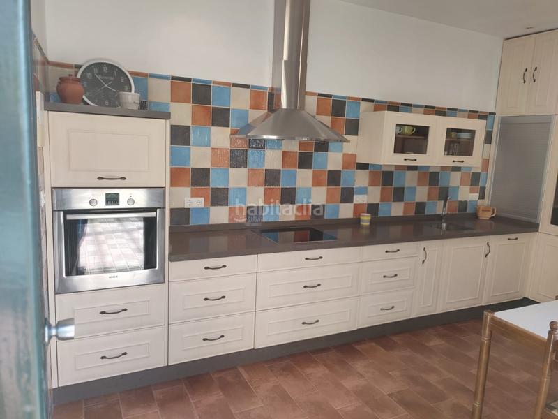 Foto 6f3c40ad-bc9a-47d5-88a0-2d91431c1fc6. Casa adossada amb calefacció a Olivares