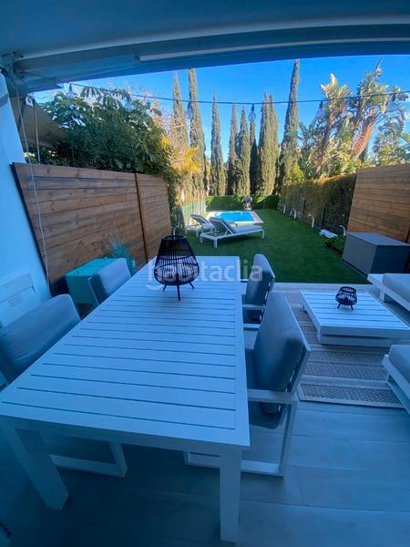 Foto cb4ddd43-d1dc-46c6-995c-0e890e20224d. Casa a schiera con riscaldamento parcheggio piscina in Benalmádena