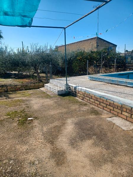 Foto 0f90e406-eb00-4597-82b7-cb0ba9c37885. House with parking pool in Sanlúcar la Mayor