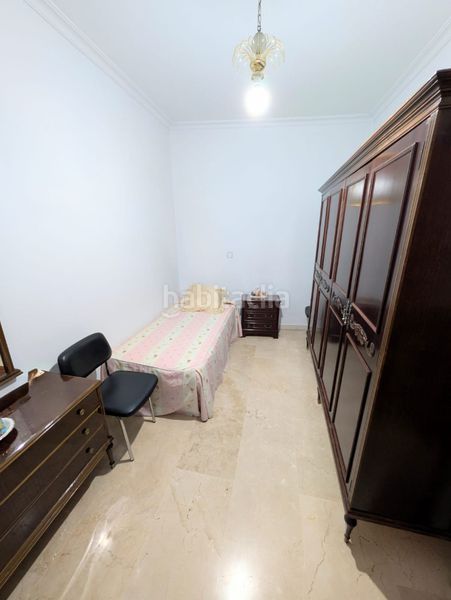 Foto f4aeb81d-5d1a-4be6-b20b-6d065329c59b. Casa amb aparcament a Palmete Sevilla