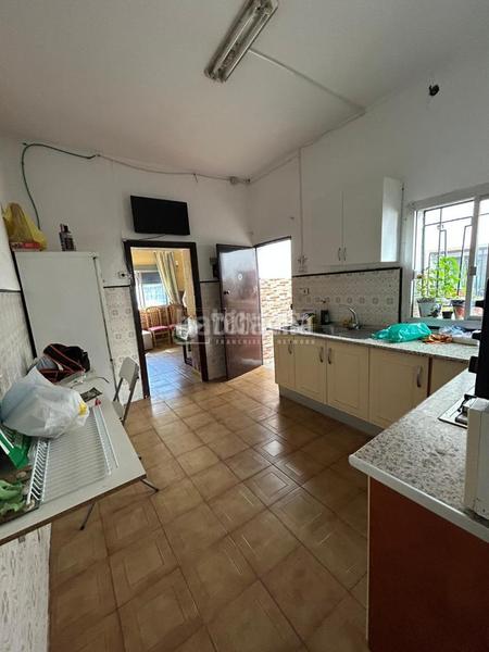 Foto aa56a39f-8c6a-49e6-80b1-2a078abf9c03. Casa aparellada a Centro Alcalá de Guadaira