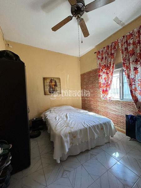 Foto f9eff6fe-7fb3-4bd6-9edd-fb9f46f78317. Casa aparellada a Centro Alcalá de Guadaira