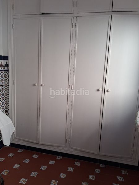 Foto 051e9c3d-a260-4844-90fd-f6d8d54b8c87. Casa amb aparcament a Puebla del Río (La)