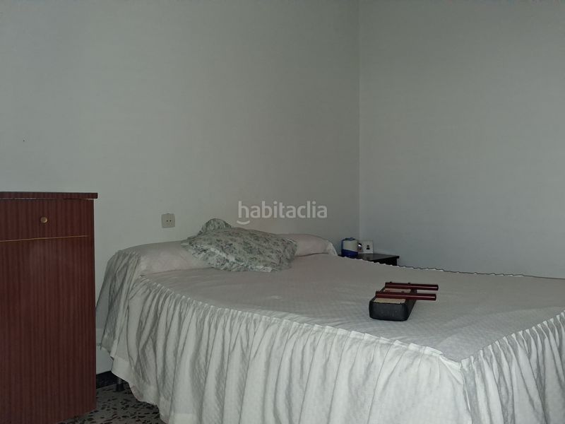 Foto 5c8f0b2b-4256-4e09-a445-d2c1d570163b. Casa amb aparcament a Puebla del Río (La)